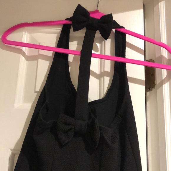 NWT black peplum top with bows - Picture 2 of 3